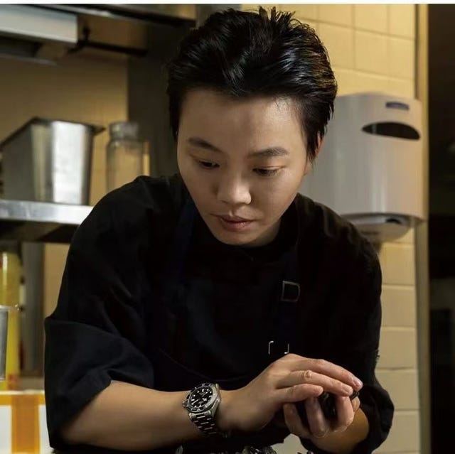 person preparing food in a kitchen setting