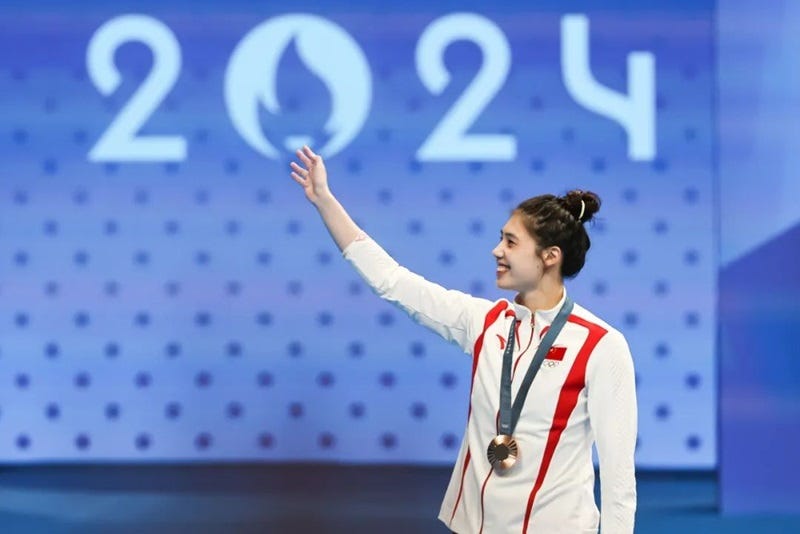 a person in a white coat