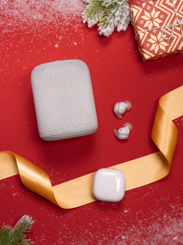 wireless audio devices displayed on a festive background