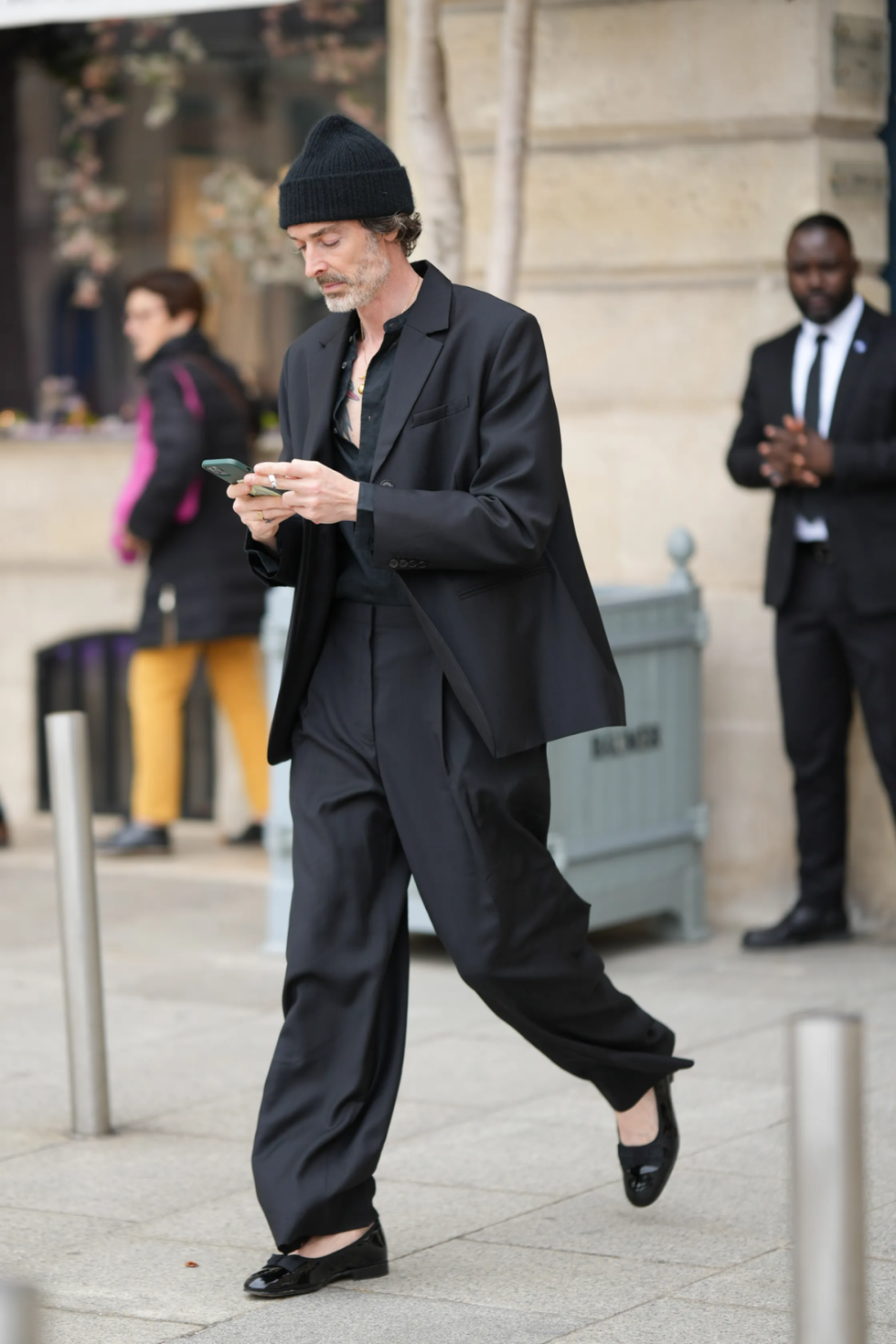a person in a suit walking