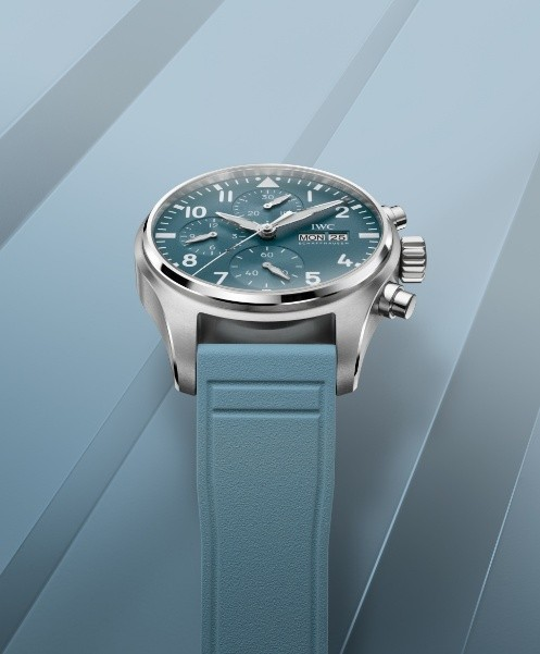 chronograph watch with a blue dial and rubber strap