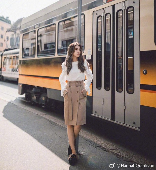 Transport, Mode of transport, Vehicle, Public transport, Street fashion, Fashion, Standing, Shorts, Passenger, Rolling stock, 
