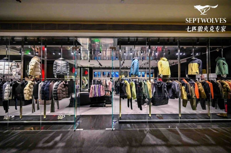 clothing display in a retail store showcasing a variety of jackets and outerwear