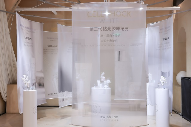 display area for skincare products featuring translucent banners and product stands