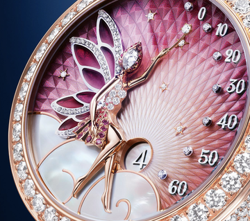 a luxurious watch featuring a fairy figure intricate designs and gemstones