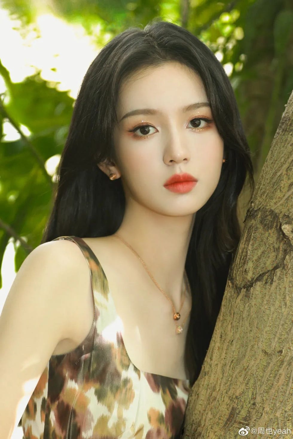 a woman with long black hair