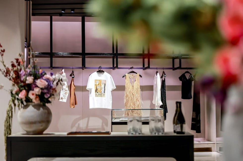 a boutique displaying a variety of clothing items and decorative elements