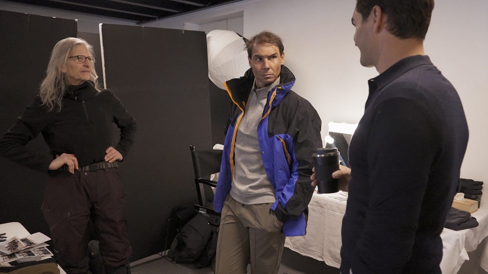 a group of people standing in a room