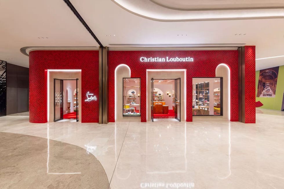 christian louboutin store entrance with striking red exterior