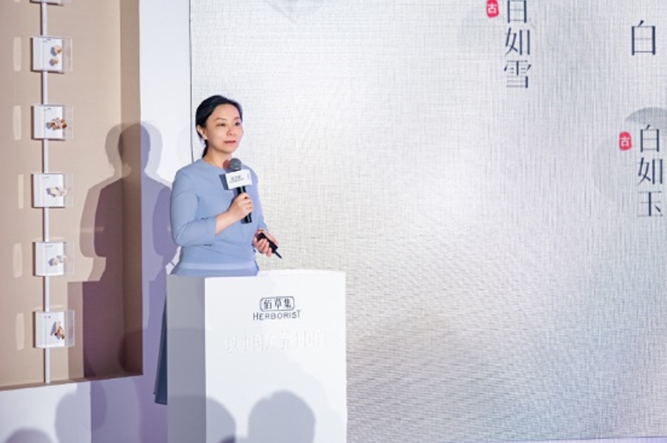 presentation at a product launch event featuring displayed items