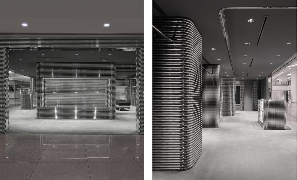 contemporary interior space featuring metallic structures and polished flooring
