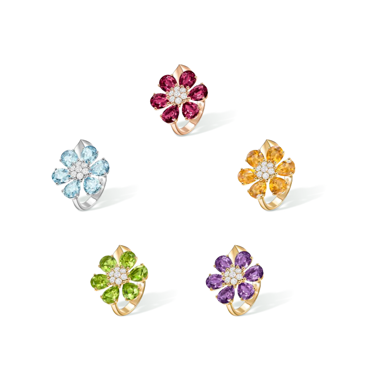 collection of colorful floral design rings featuring various gemstones