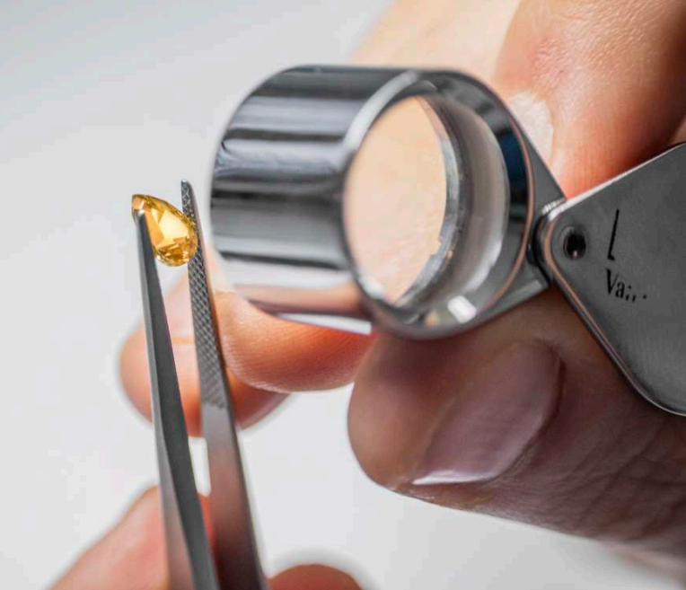 inspection of a gemstone using magnification tools