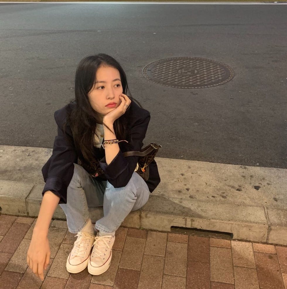 Sitting, Leg, Long hair, Photography, Smile, Black hair, Jeans, Fawn, 