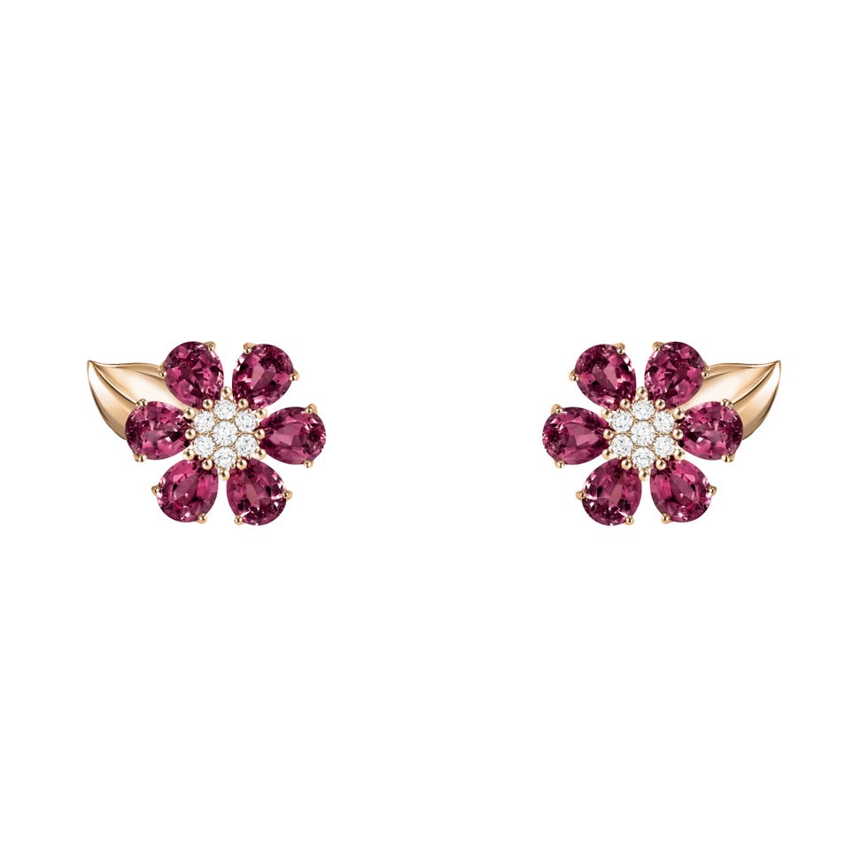 floralshaped earrings with pink gemstones and gold accents