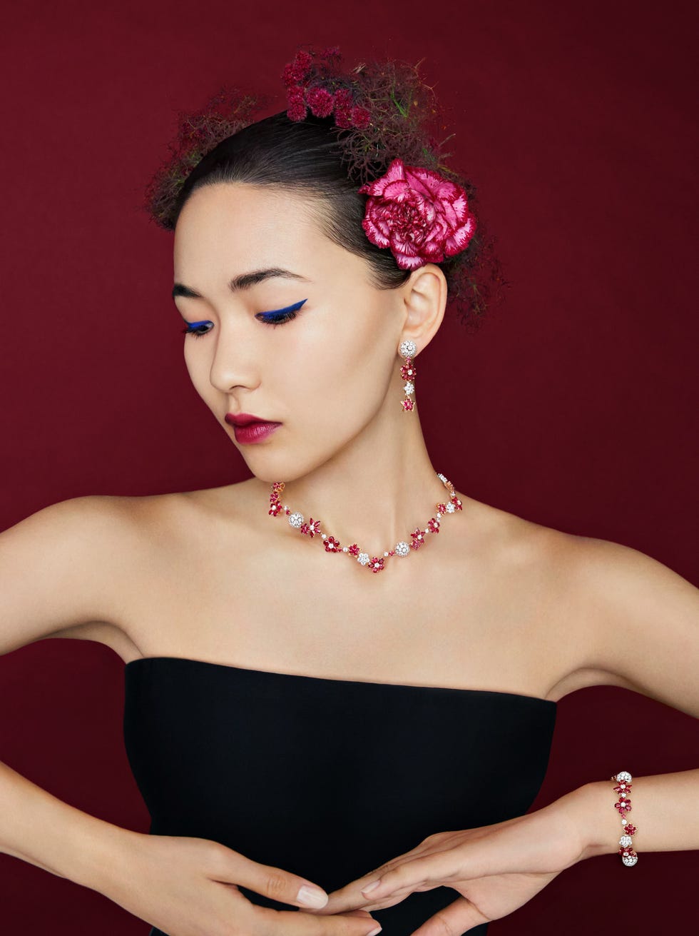 a woman with a flower in her hair