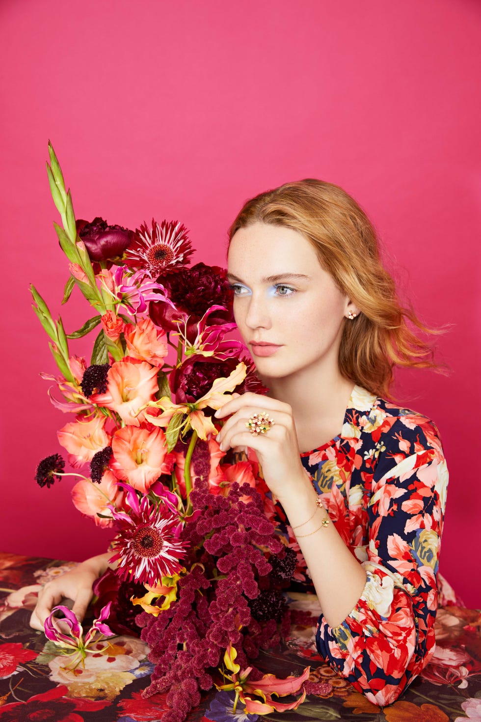 a person holding a bouquet of flowers
