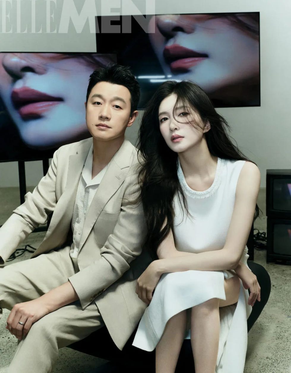 portrait of two individuals seated with digital screens displaying closeup lips in the background