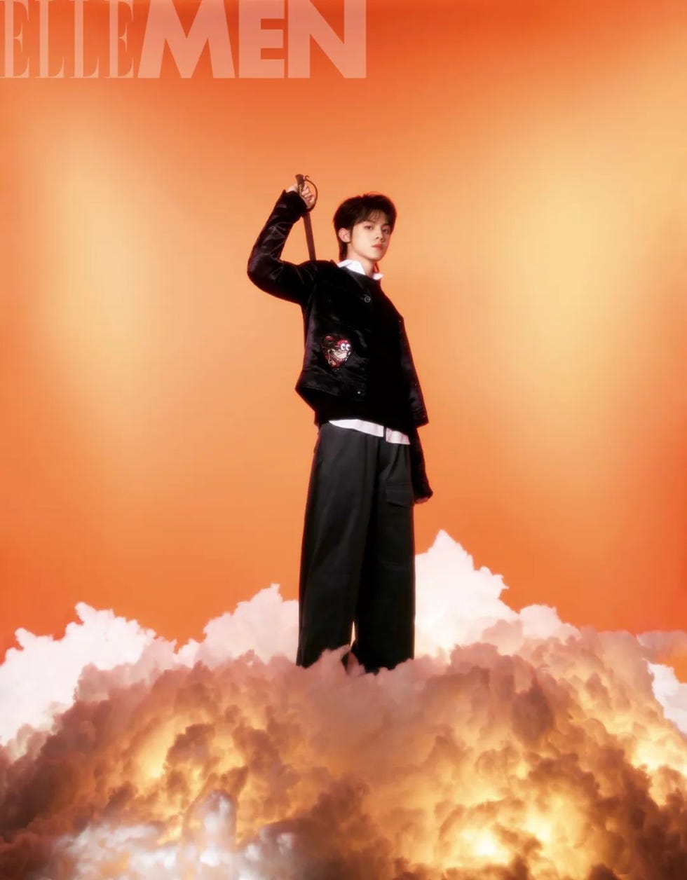 fashion editorial featuring a model holding a sword