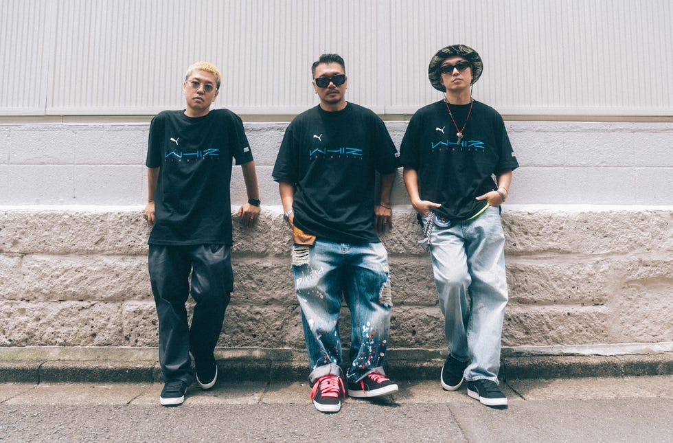 a group of men posing for a picture
