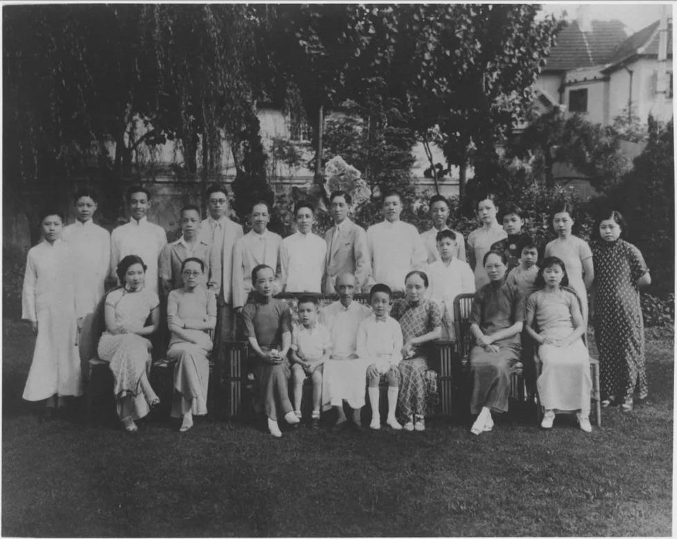 group portrait of individuals in a garden setting