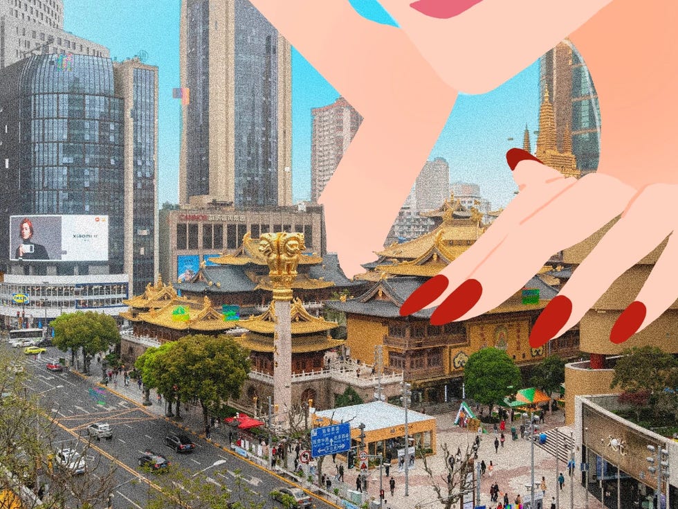 urban scene featuring a traditional chinese temple and modern buildings