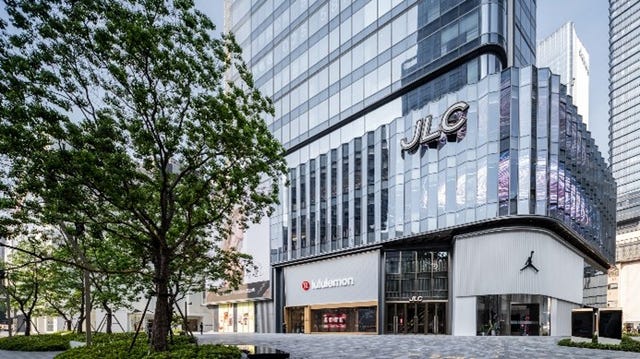 sport retail stores with a modern glass facade