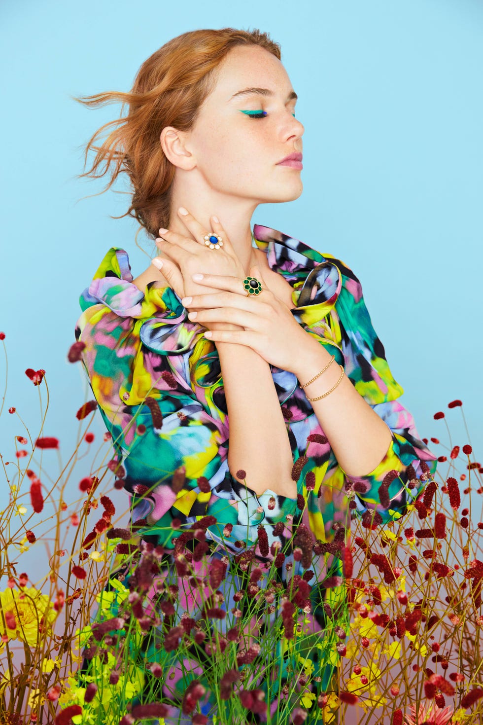 a woman in a colorful dress