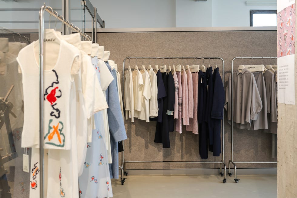 a group of clothes in a store