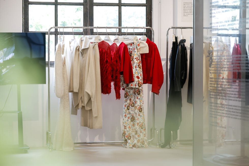 a group of clothes in a room