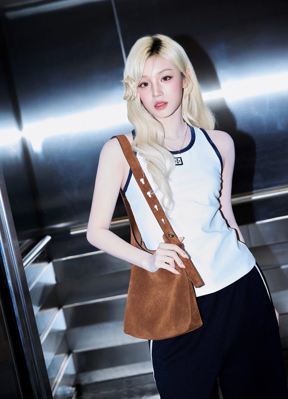 a person wearing casual attire in a modern setting
