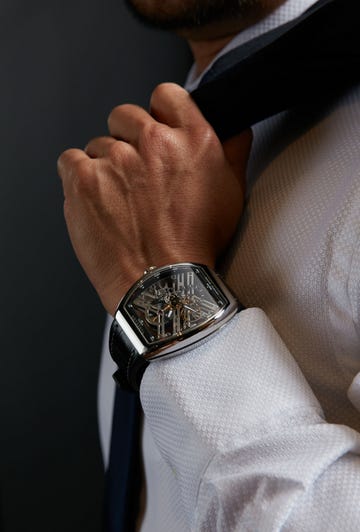 Hand, Wrist, Arm, Finger, Tie, Gesture, Thumb, Fashion accessory, 