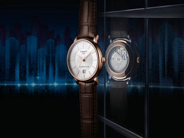Analog watch, Watch, Still life photography, Material property, Fashion accessory, Clock, Darkness, Strap, Brand, Glass, 