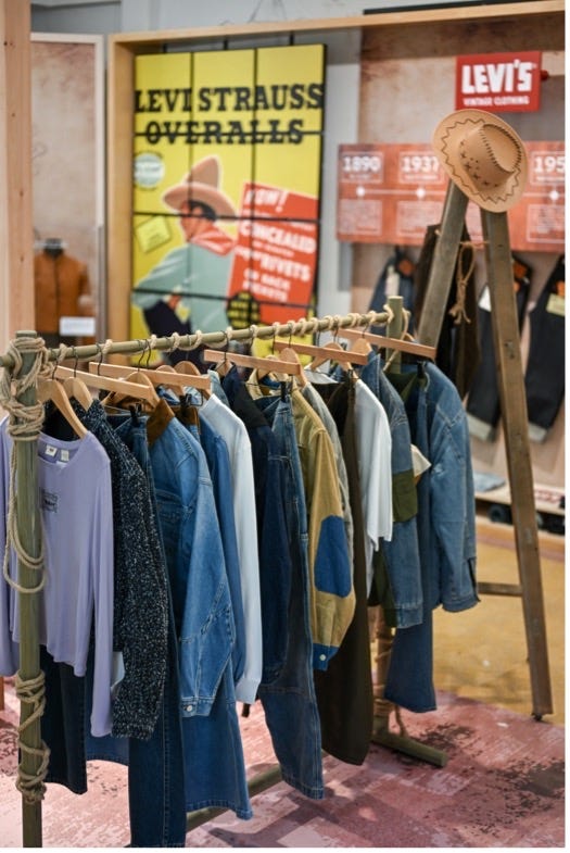 display of vintage levi strauss overalls and clothing