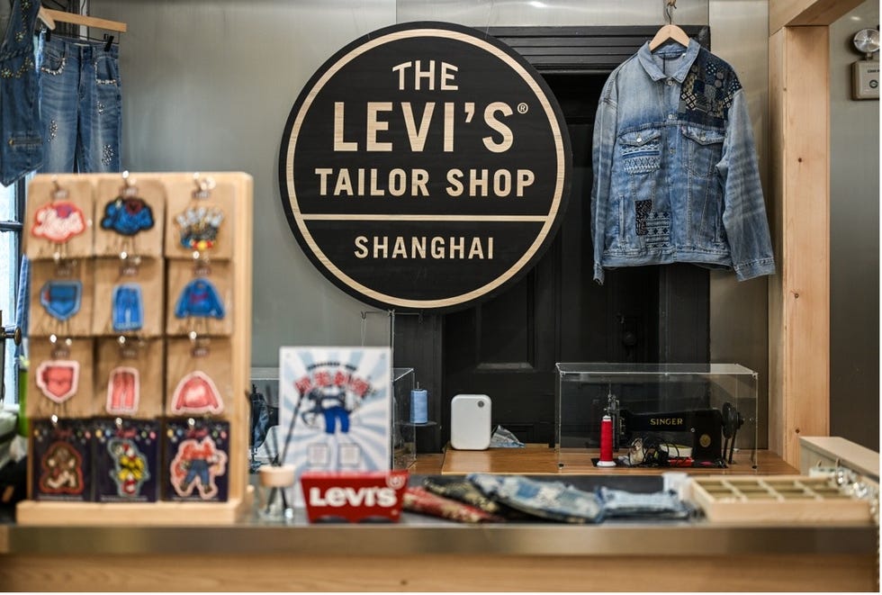 levis tailor shop in shanghai featuring denim clothing and customization options