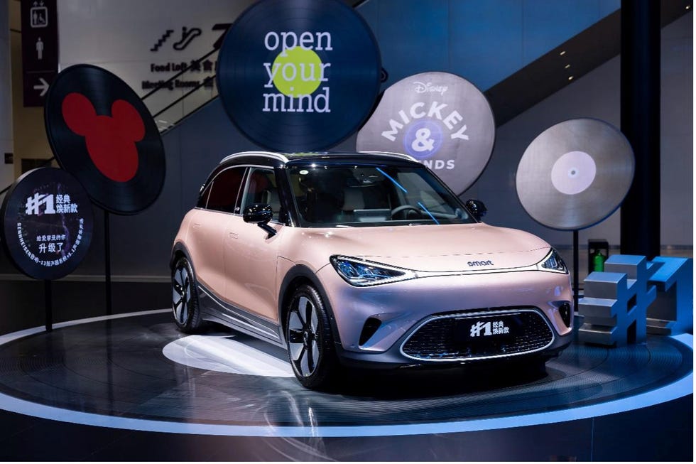 the exhibition of the brand new smart #1 model with disney billboards around it as background