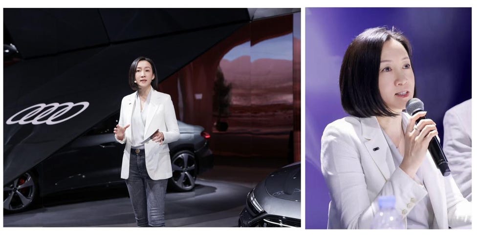 presentation at an automotive event featuring sleek cars and a speaker
