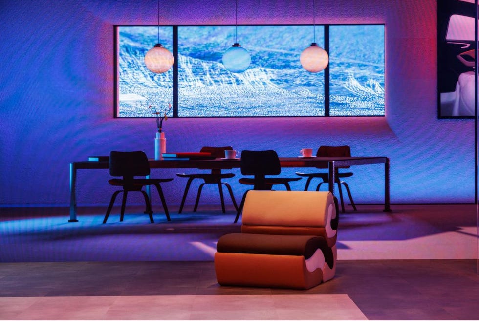 a modern living room presenting designer brand furnitures