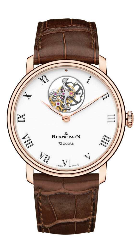 Watch, Analog watch, Watch accessory, Strap, Fashion accessory, Brown, Jewellery, Material property, Brand, Hardware accessory, 