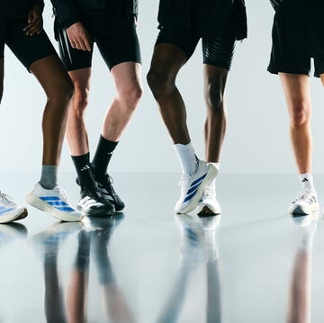 athletes showcasing footwear in sporty attire athletes showcasing footwear in sporty attire