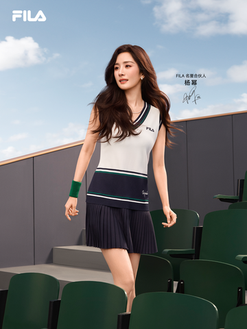 model showcasing fila sportswear in a seating area