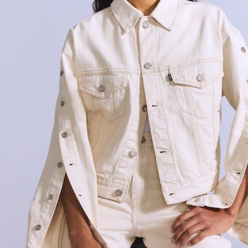 stylish creamcolored denim jacket with unique wide sleeves