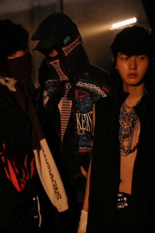 group of individuals dressed in diverse streetwear fashion