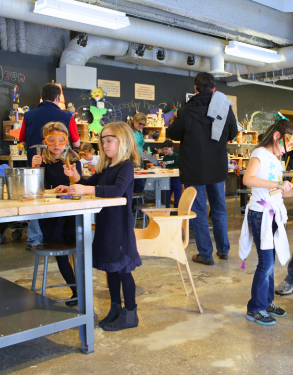 creative workshop environment with children and adults engaged in handson activities