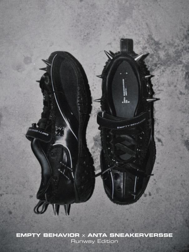 unique black sneakers with spikes and distinctive branding