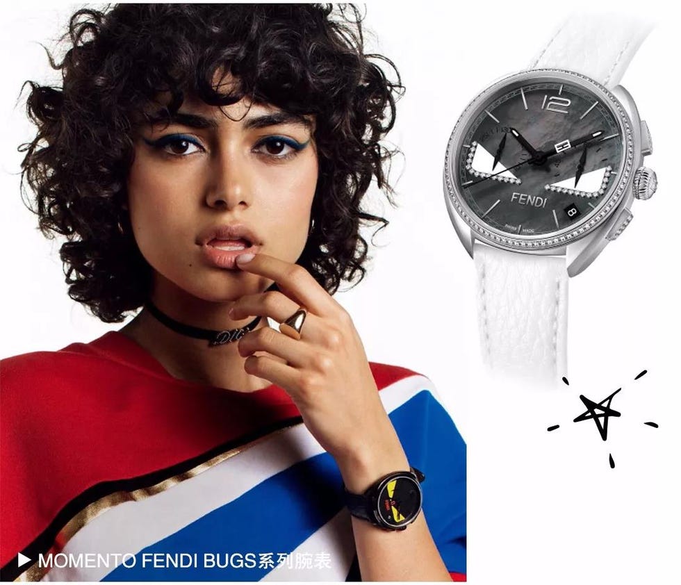 Watch, Chin, Lip, Human, Black hair, Album cover, Material property, Mouth, Fashion accessory, Photography, 