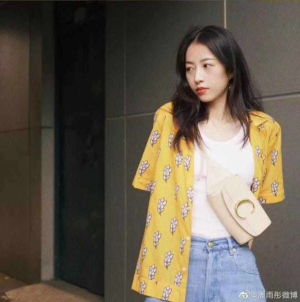 Clothing, Yellow, Outerwear, Street fashion, Sleeve, Fashion, Blazer, Textile, Neck, Fashion model, 