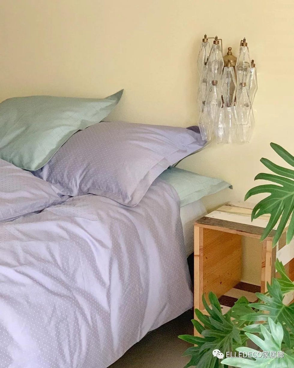 Furniture, Bedroom, Bed sheet, Room, Bedding, Bed, Green, Bed frame, Interior design, Wall, 