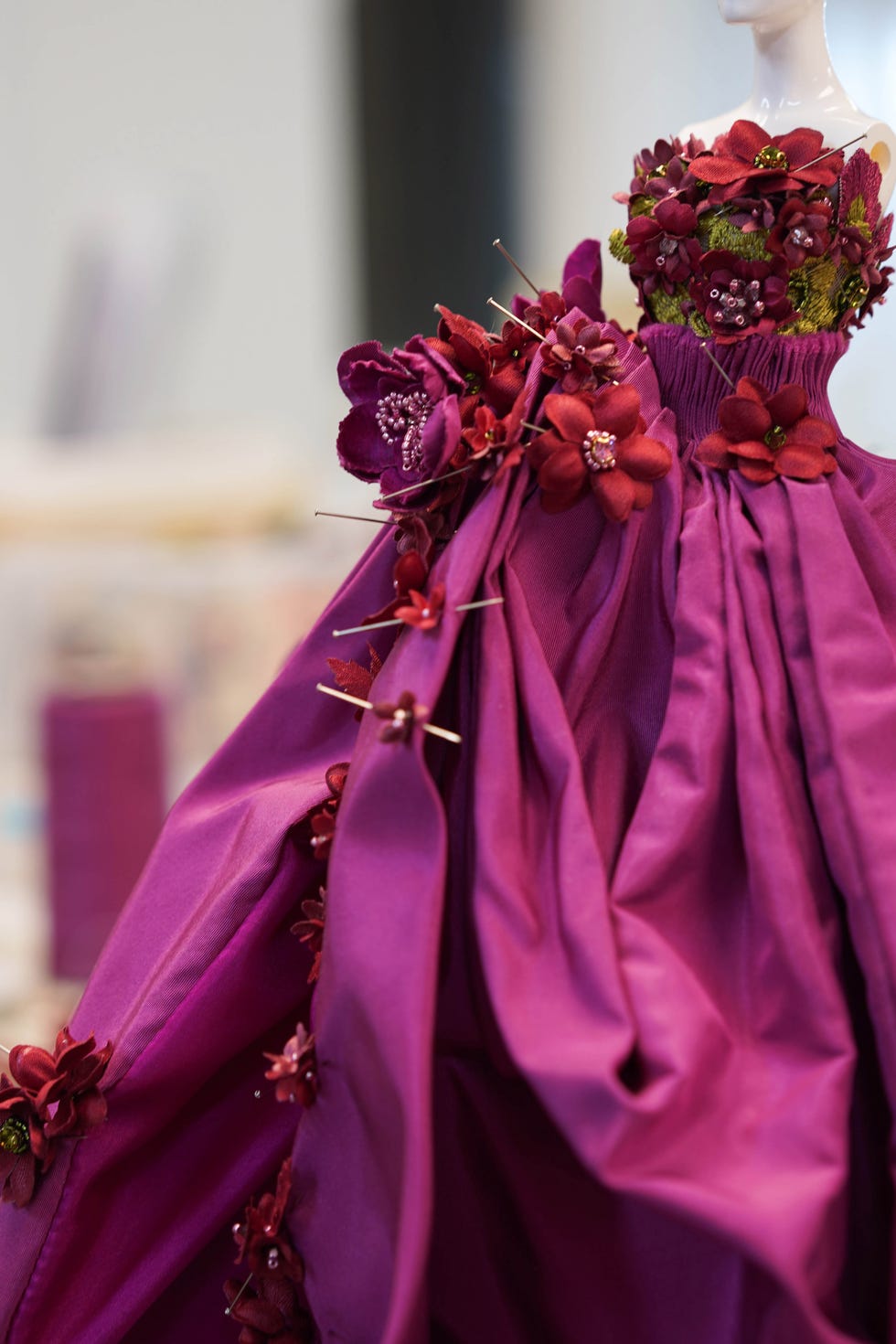 a woman wearing a purple dress