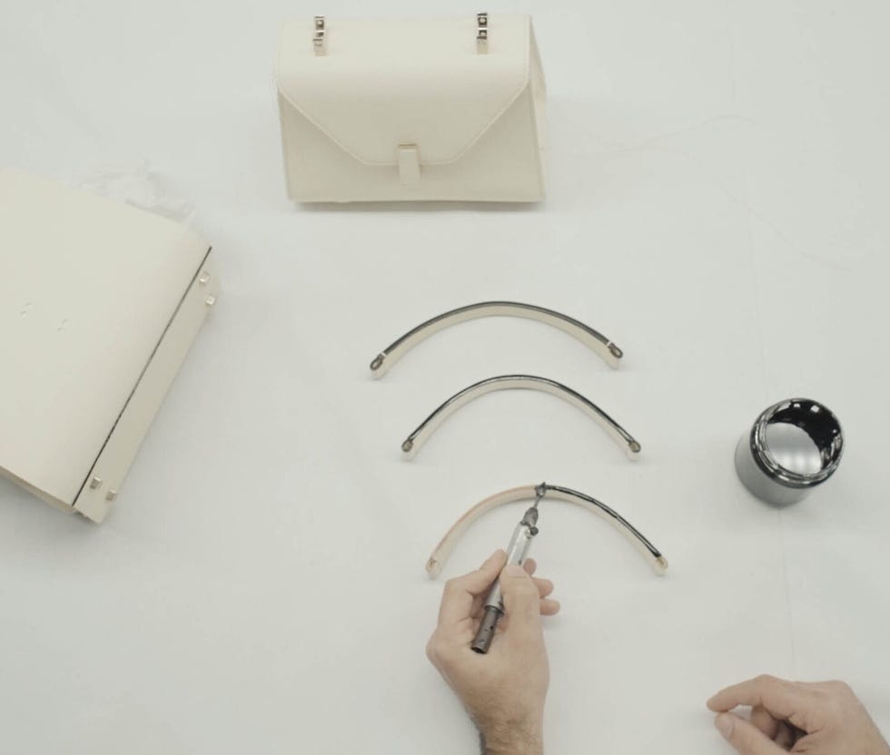 workstation with a handbag curved handbag frames and a tool